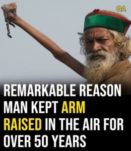 Remarkable reason man kept arm raised in the air for over 50 years